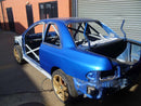 Custom Cages Subaru Impreza GC8 2 Door International Multipoint T45 Weld-in Roll Cage
