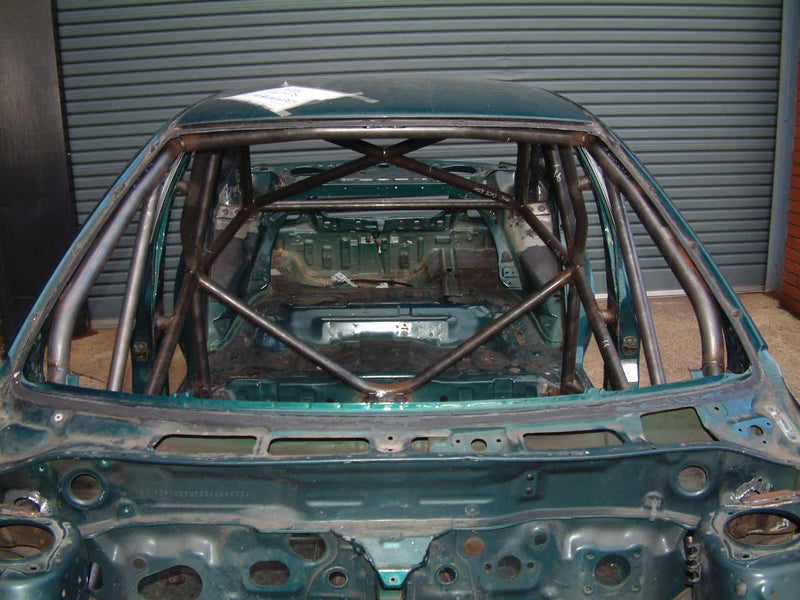 Custom Cages Subaru Impreza GC8 4 Door International Multipoint T45 Weld-in Roll Cage
